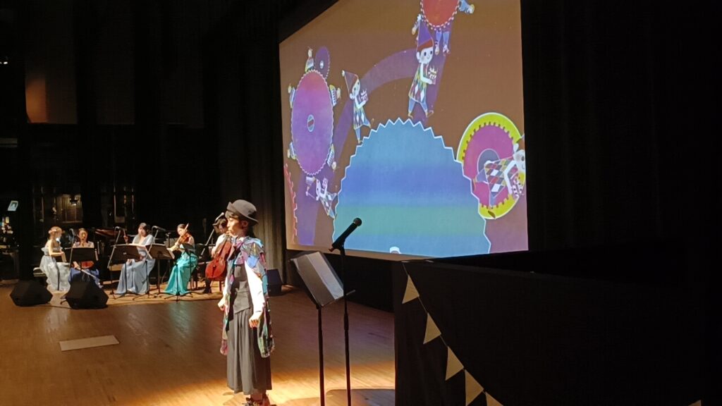 音楽と絵本の読み聞かせがひとつになるライブ絵本ルーミーパーク